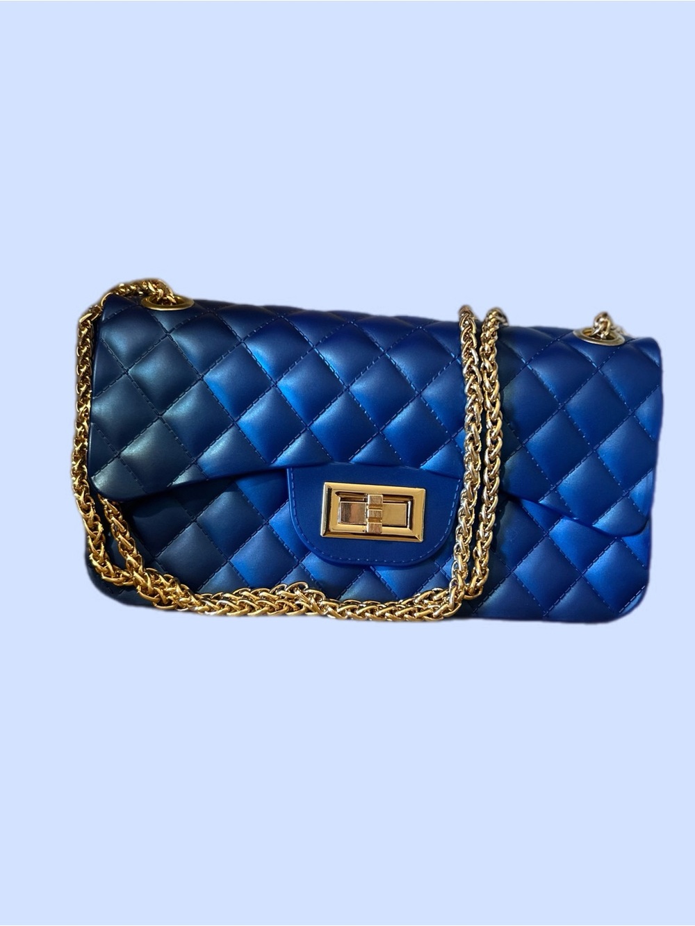 Quilted Jelly Chain Shoulder Bag in Metallic Blue with Gold Hardware.